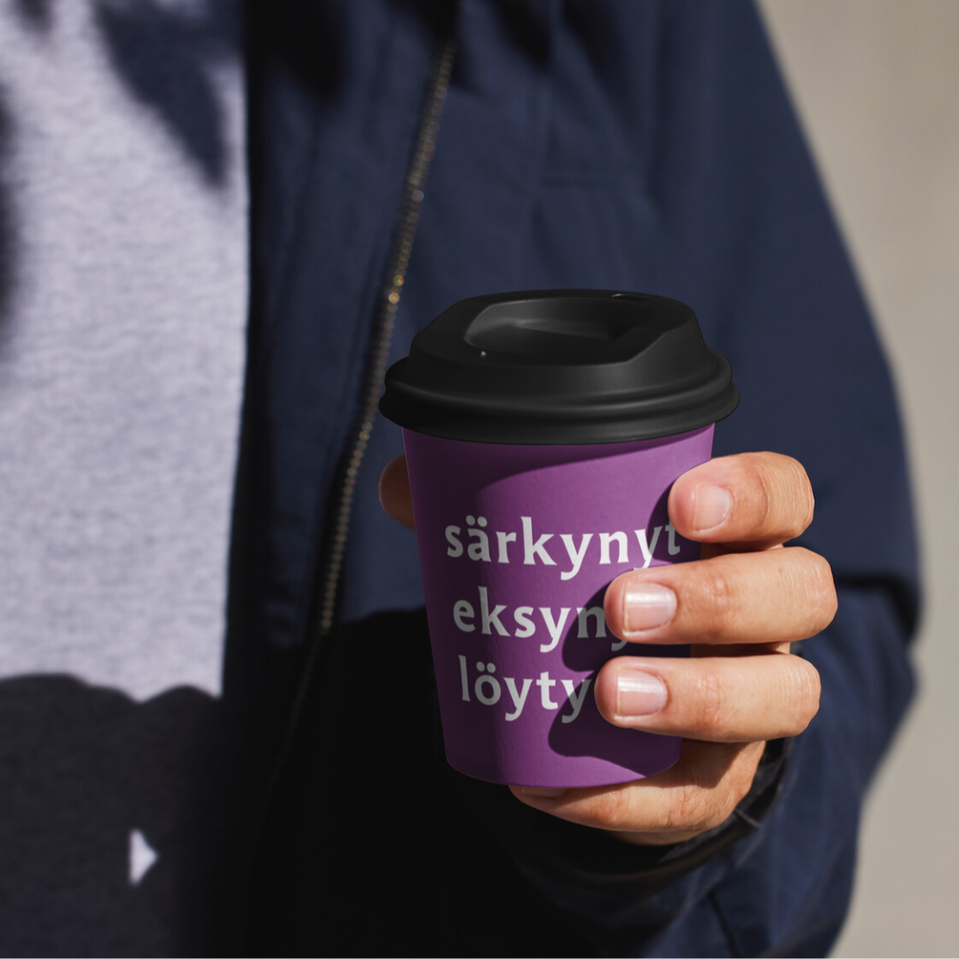 Seurakuntavaalien mainoskuva, jossa purppurainen mainosmuki. 